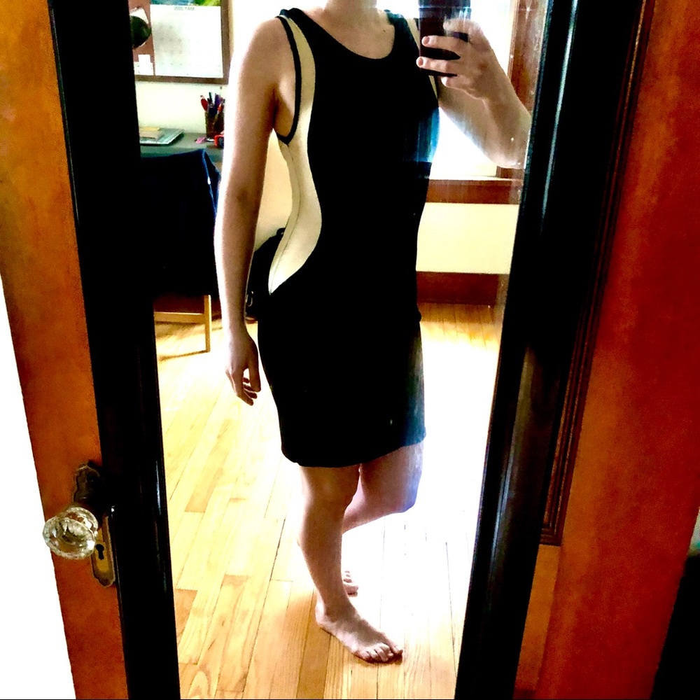 Little black dress with nude mesh panels